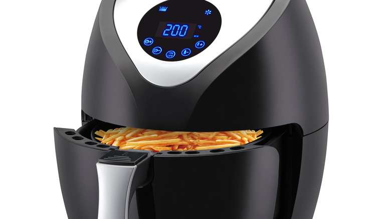 air fryer being opened