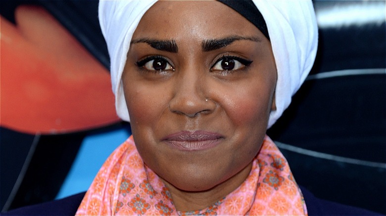 Nadiya Hussain smiling with pink scarf