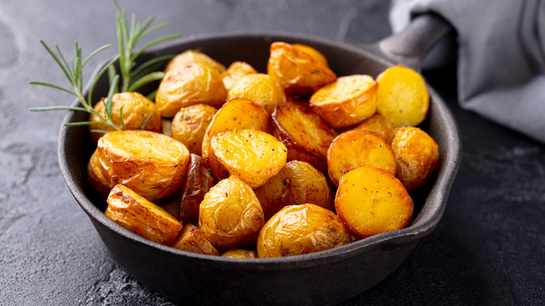 fried potatoes in cast iron pan