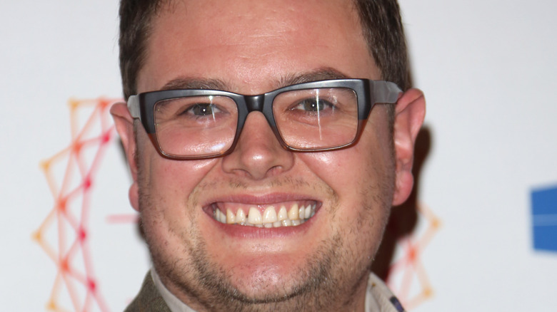 Alan Carr smiling