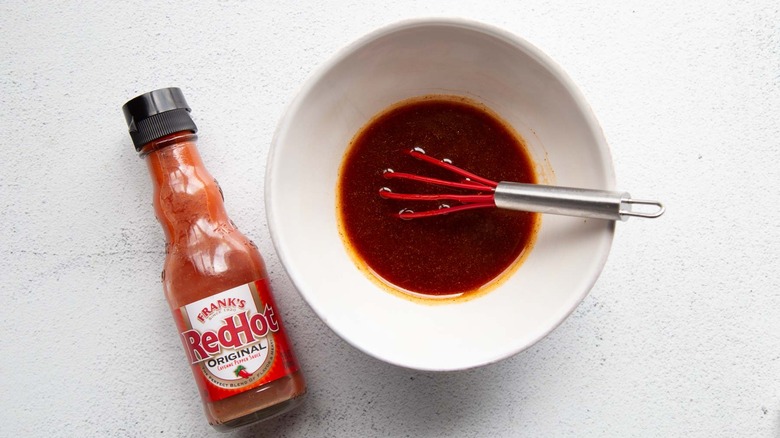 spicy honey sauce with whisk