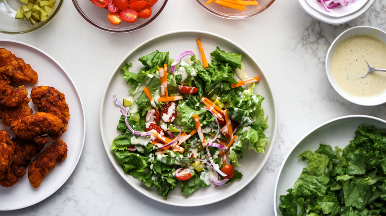 green salad on white plate