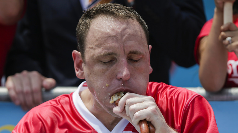 Joey Chestnut eating hotdogs