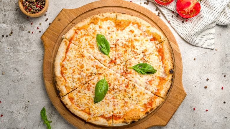 Cheese pizza with basil