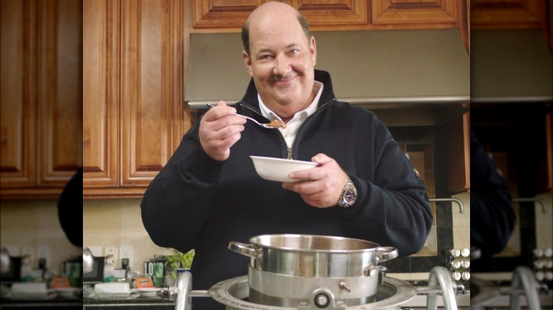 Brian Baumgartner eating a bowl of chili