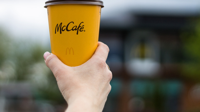 McCafe coffee in hand