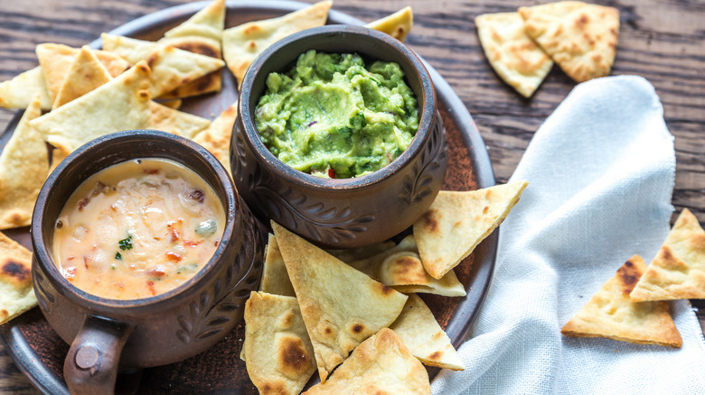 Queso and guacamole with chips