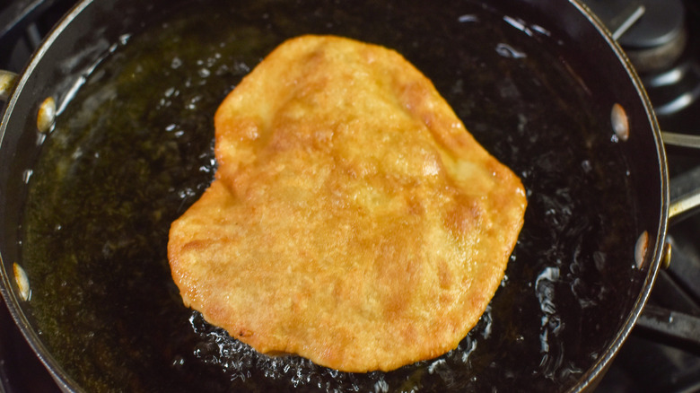 dough frying in skillet