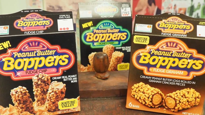 three boxes of Peanut Butter Boppers