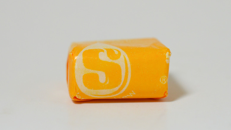 Single yellow Starburst candy