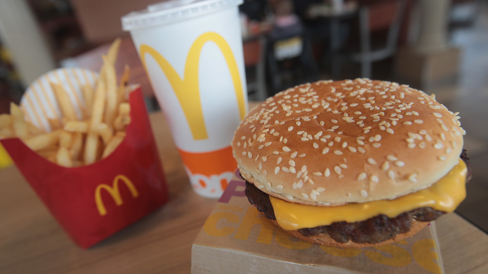 A burger and fries with drink from McDonald's