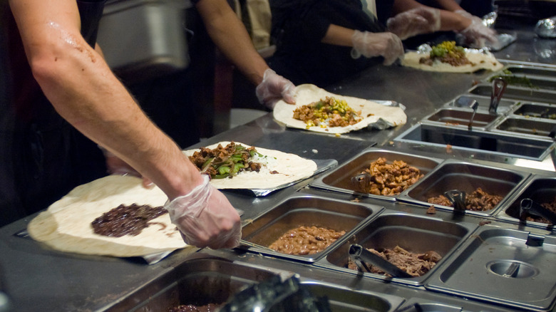 Chipotle orders being prepared