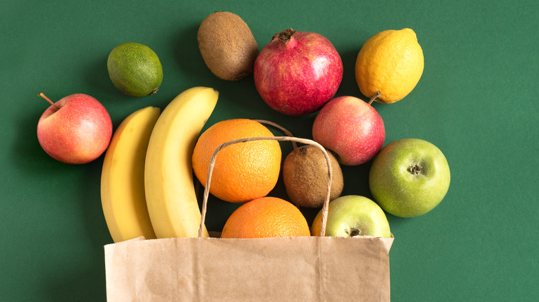 Fruit coming out of a paper bag