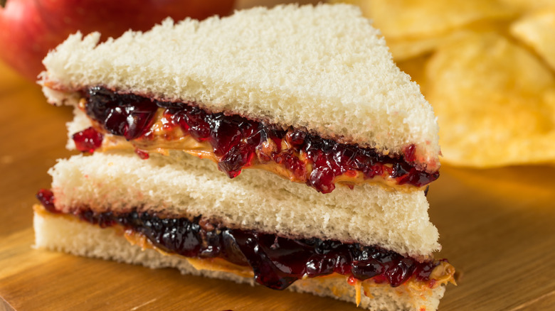 Peanut butter and jelly sandwich on table