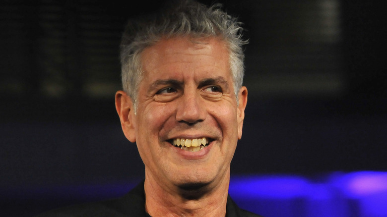 Anthony Bourdain smiling in a candid shot