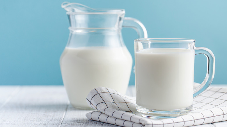 pitcher and glass of milk