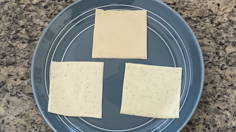 Unwrapped Kraft Singles on plate