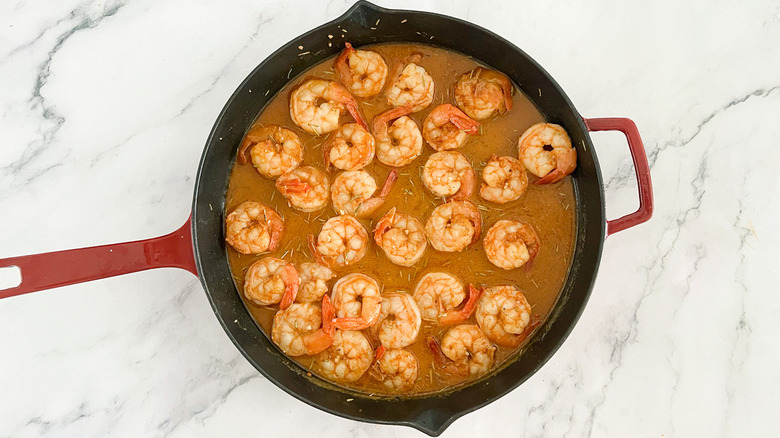 shrimp and sauce in pan