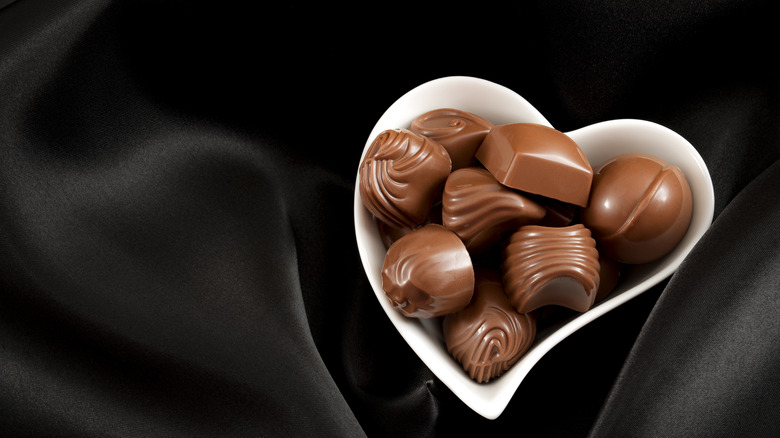 chocolates in heart shaped bowl