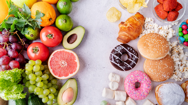 Healthy and unhealthy food on table