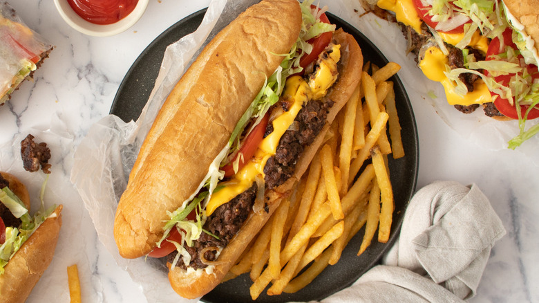 chopped cheese sandwich with fries