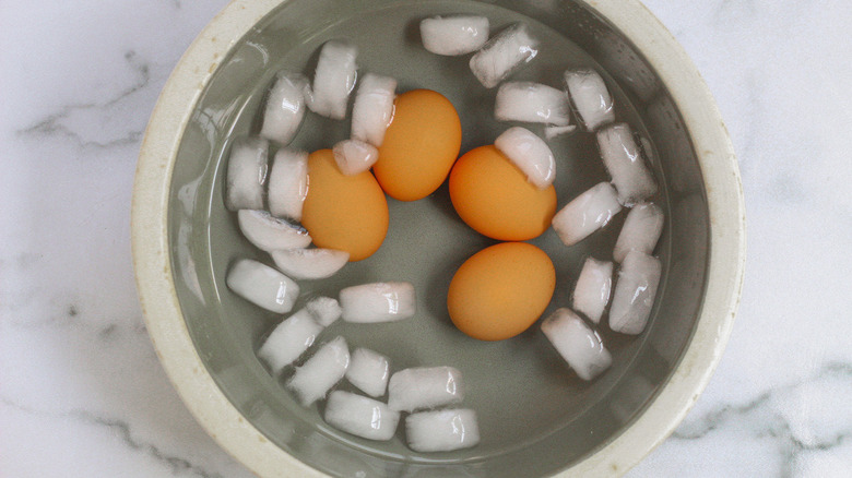 hard-boiled eggs in ice bath