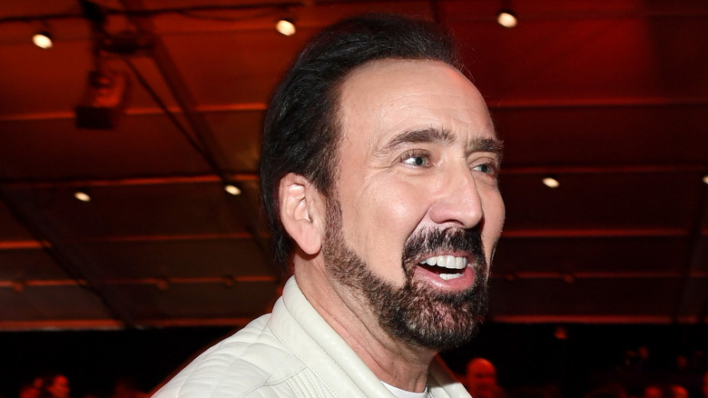 Nicolas Cage laughing at event