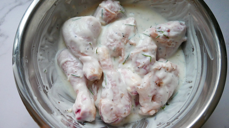 chicken marinating in buttermilk