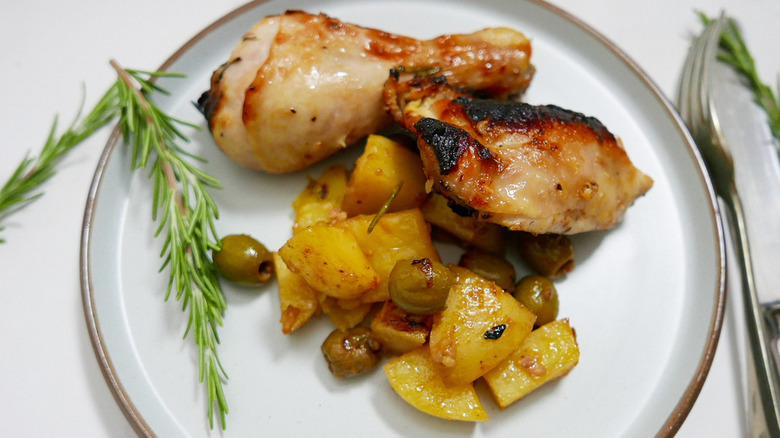 chicken and potatoes on plate