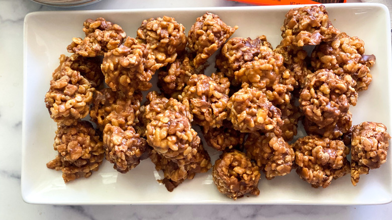 plate piled with krispie reese's balls