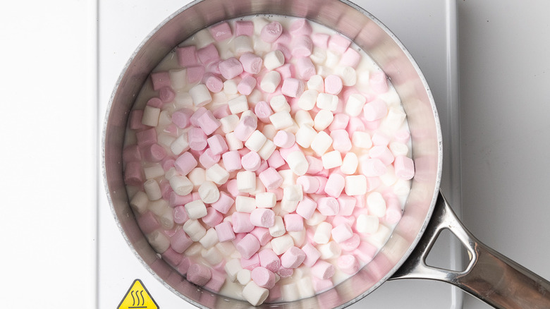 marshmallows and milk in pan 
