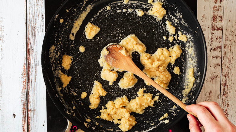 stirring roux in pan