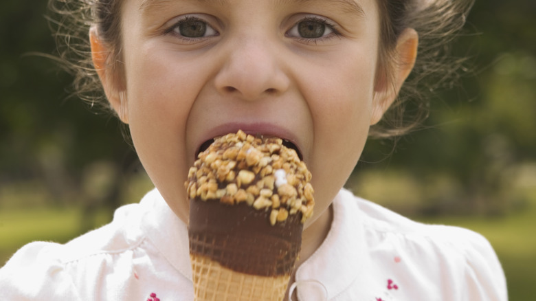 Child eating Drumstick 