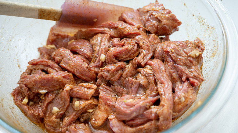 raw sliced beef in bowl