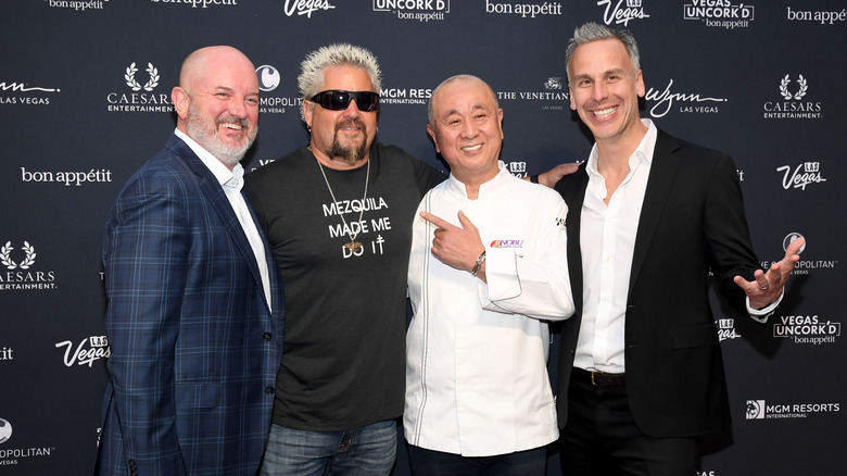 Chef Nobu posing with other celebrity chefs