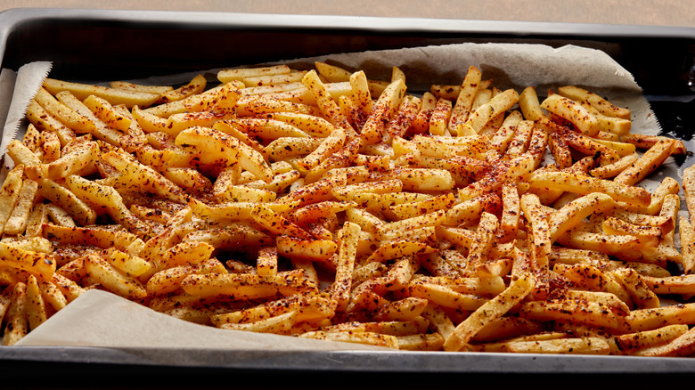 French fries on baking sheet