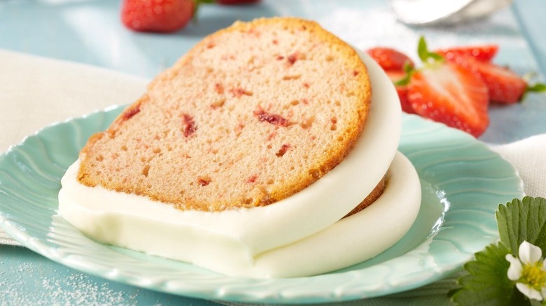 A strawberry bundt cake with frosting