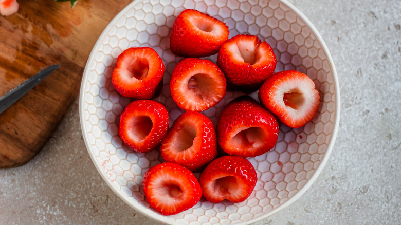 bowl of cored strawberries