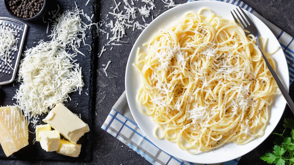 spaghetti with parmesan cheese and black pepper