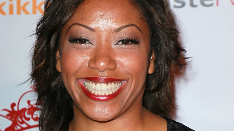 Nyesha Arrington smiles