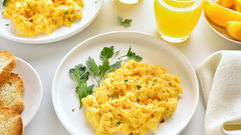 Scrambled eggs and orange juice