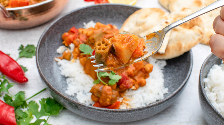 okra curry with fork