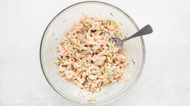 Shrimp salad mixture in large glass bowl