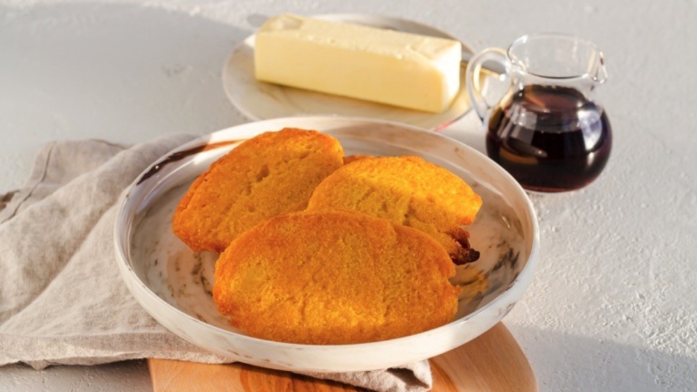 Old-Fashioned Corn Pone on a plate on a counter