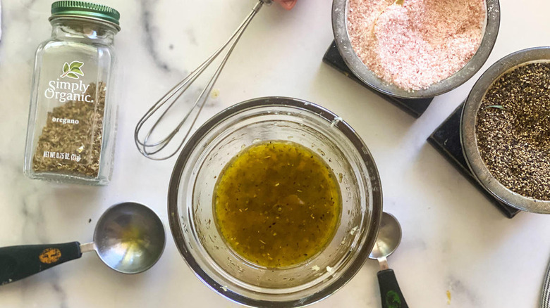 Olive oil and lemon zest dressing mixture