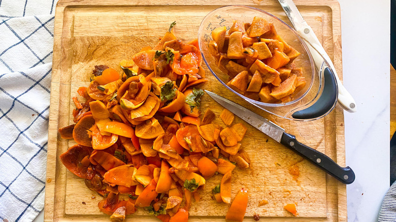 persimmon on a cutting board 