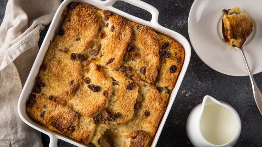 bread pudding with raisins in a casserole dish