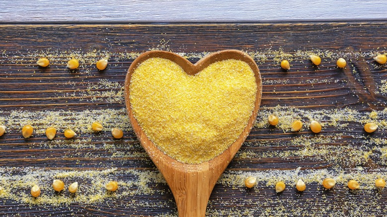 cornmeal on wooden spoon