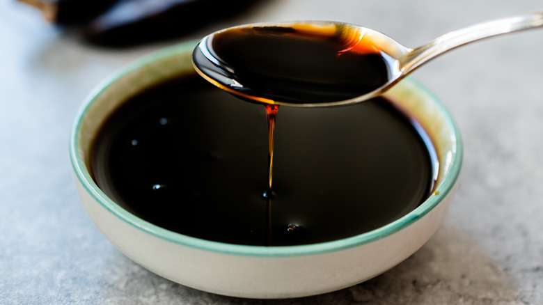 molasses in bowl with spoon