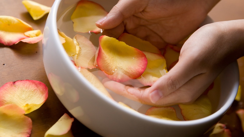 water with roses in bowl